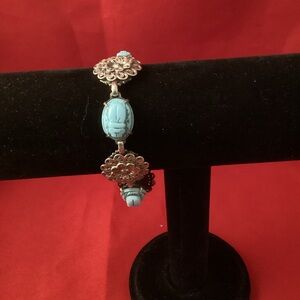 Silver tone and blue scarab with flower bracelet